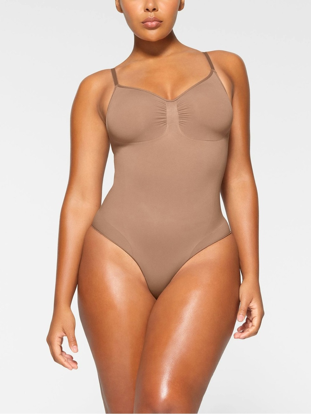 SKIMS SEAMLESS SCULPT
Brief Bodysuit — S/M Sienna